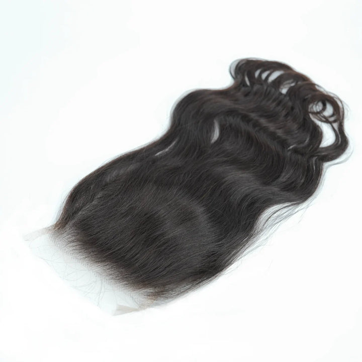 Black hair extensions on a white background