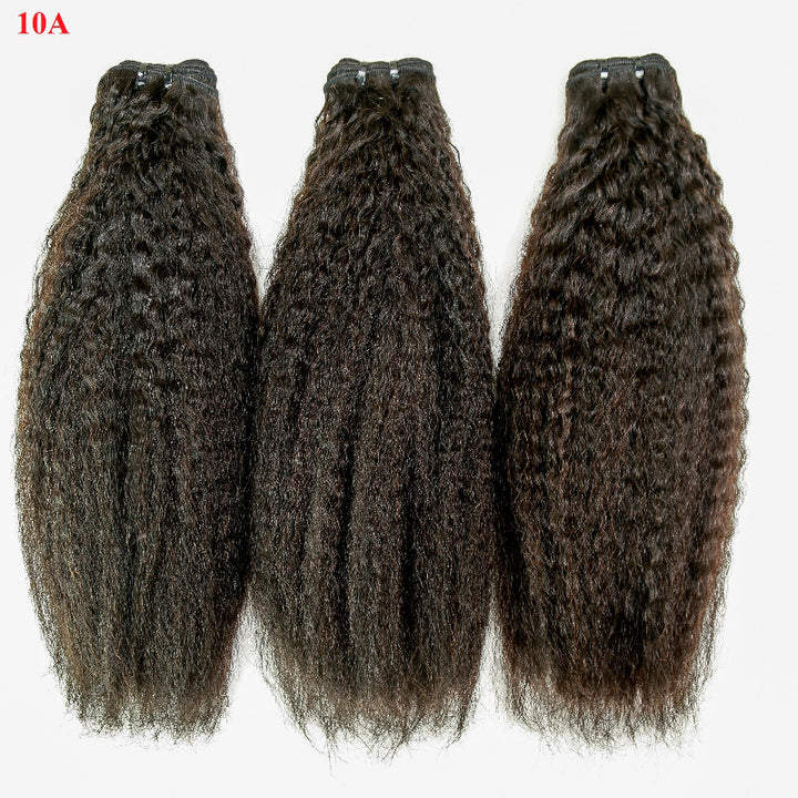 Three bundles of curly hair extensions on a white background