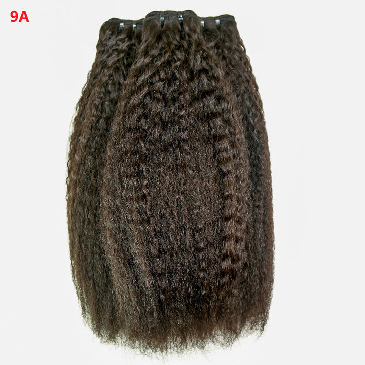 Brown hair extensions with clips on a white background